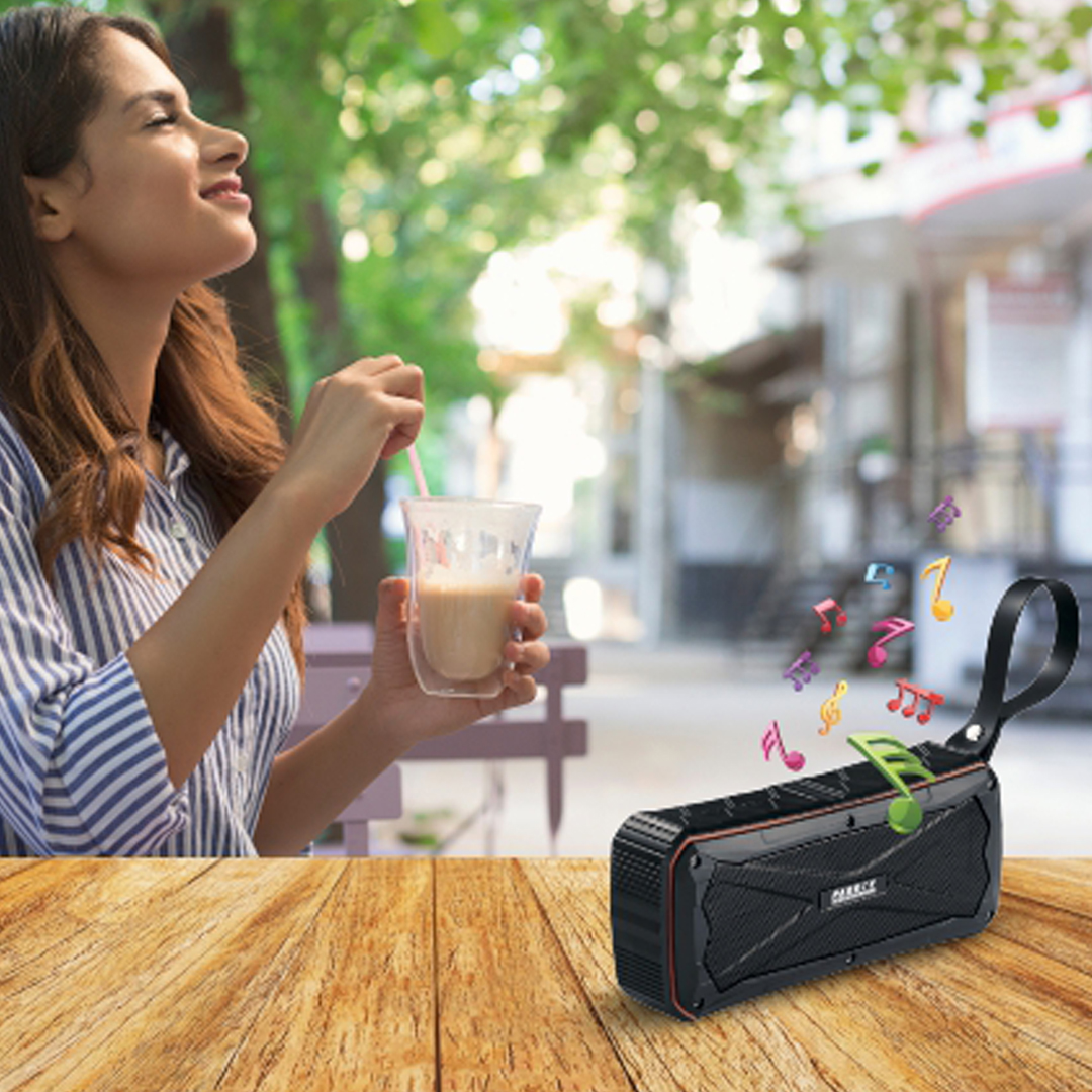 Lady Listening To Wireless Speaker